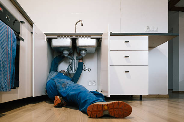 Professional Emergency Plumber technician working in West Boxford, MA